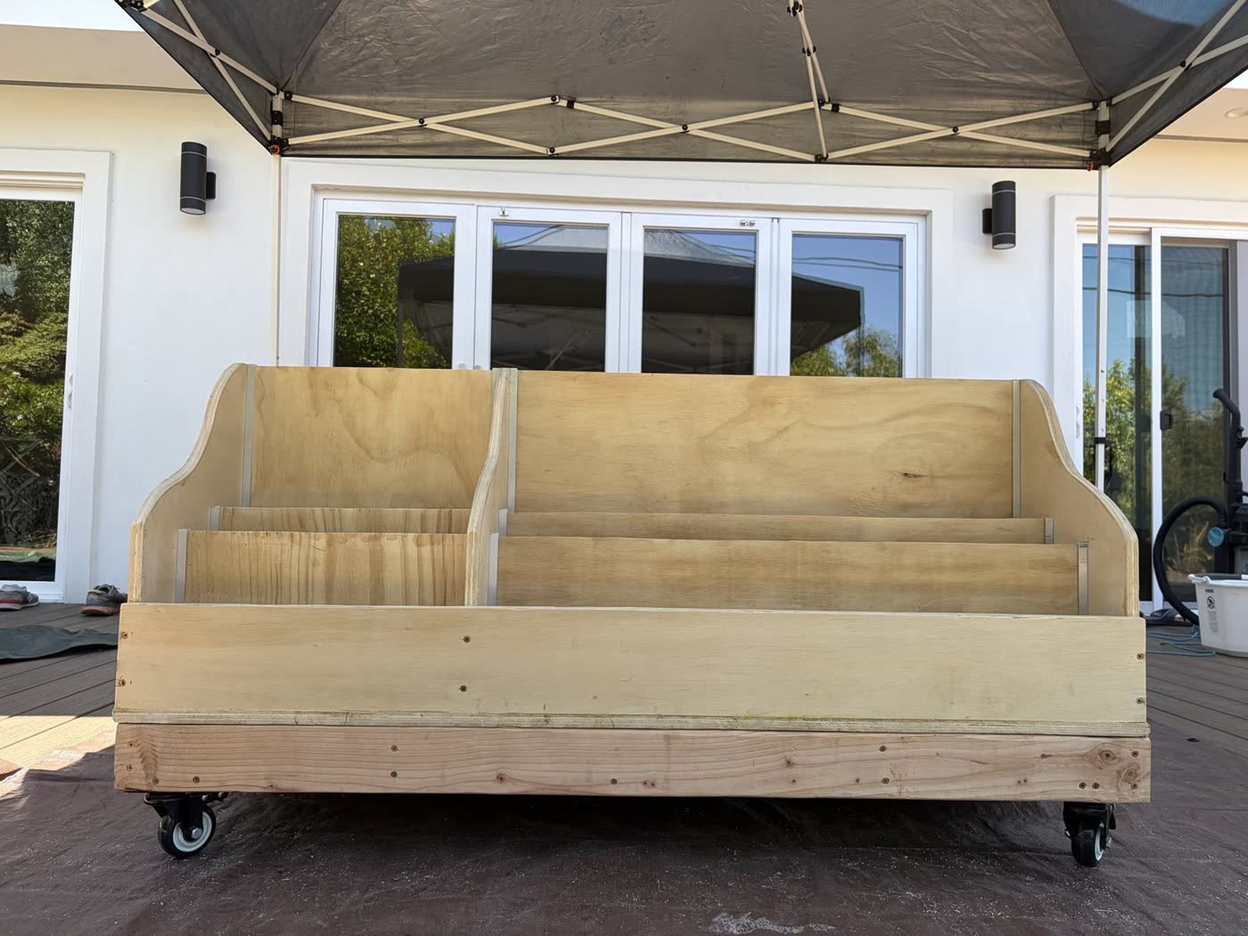 The finished plywood storage cart from the front