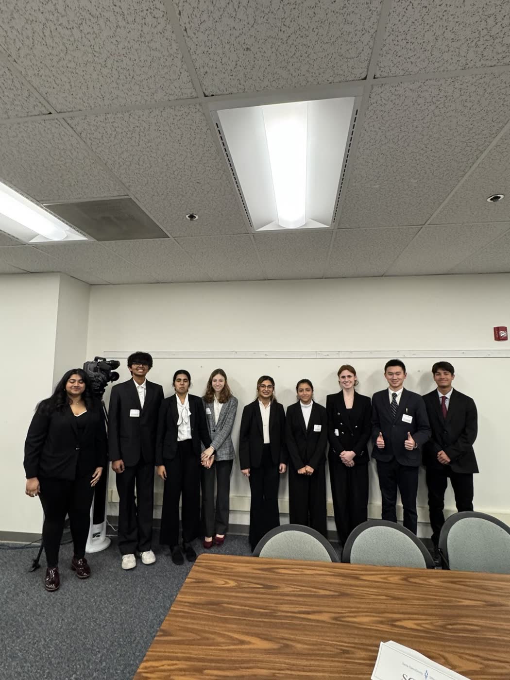 Vihaan with teammates at a Santa Clara County mock trial round